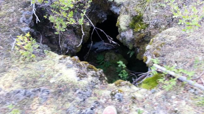 Note the toe of my boot - this is one of the small openings to lava tubes below
