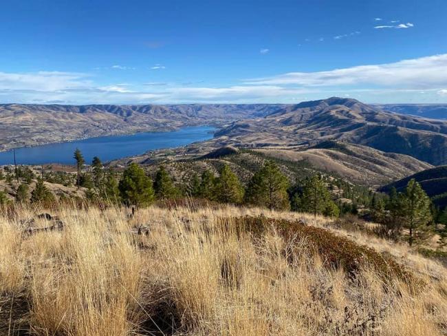 The view to the east. Lake Chelan, the city of Chelan, and Chelan Butte