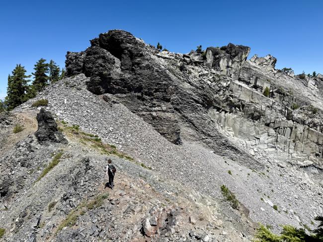 Me hiking along a ridge on the summit approach