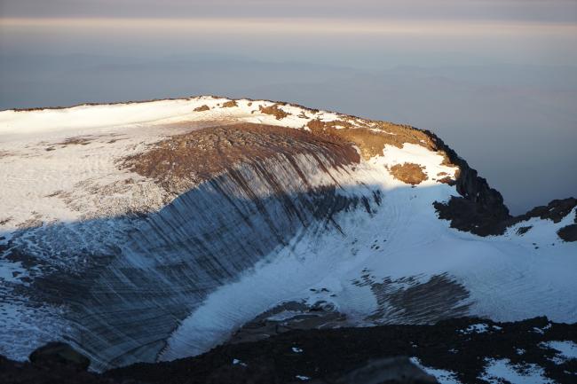 Melted out summit crater