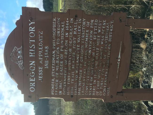 Historical marker by entry road