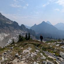 View of the ridge from Wolf Peak to Sperry Peak, which is visible to the left of the photo