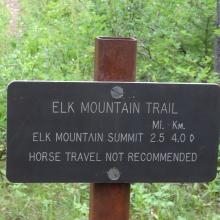 The turnoff to the Elk Mountain Trail near Fielding Cabin