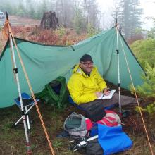 Matt-KF7HIZ taking shelter on Peak 2300