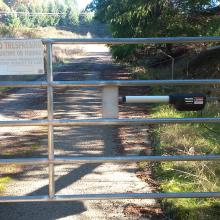Gate and No Trespassing sign