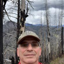 K7MAS with dark clouds and rain approaching.  Time to pack up and descend!