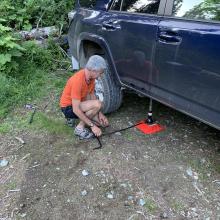 Flat Tire repair at TH.  Tim, KG7EJT subs as Mechanic!