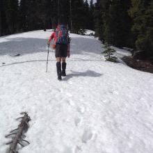 KG7EJT trudging and post holing up final slopes of Hicks Butte