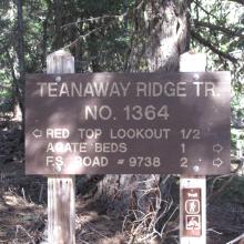 At base of summit formation, on summer trail