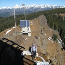 Tim, KG7EJT, Dexter the SOTA Dog & the Wenatchee Mountains with Mount Stuart prominent