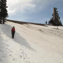 Starting down the snow slopes below the ridgecrest