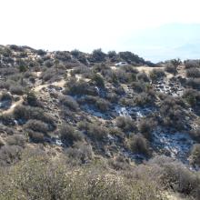 Our vehicle from Eureka Peak summit, with a dusting of fresh snow in the foreground.