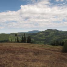 View North from mid-mountain.  In near and far perspective 2 other SOTA Summits.
