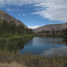 Antilon Lake, from the top of the earthen dike forming it.