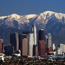 San Gabriels tower over Los Angeles in a winter long telephoto shot.