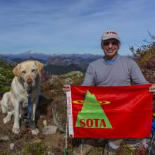 K7MAS on summit of Cowboy Mountain with Dexter the SOTA Dog