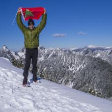 Tim, KG7EJT with SOTA flag at summit of Granite Mtn.