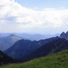 On the ridge top, before the heading down the slope to the established trail... Shriner Peak and Double Peak can be seen.  Looks like storm clouds coming our way.